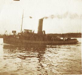 Málaga, práctico de vapor maniobrando en la rada. Fotógrafo desconocido.