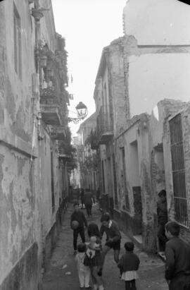 Calle, barrio de El Perchel. 1965, enero. Málaga, España