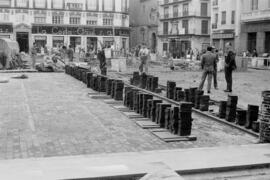 Obras de remodelación en la plaza de la Constitución. Marzo de 1960. Málaga, España