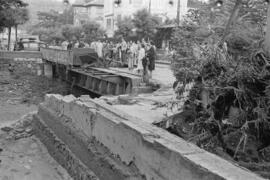 Arroyo de La Caleta y calles embarradas por las inundaciones del 29 de octubre de 1955. Málaga, España.