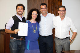 Cristina Ortega, Antonio Hierro y Álvaro García con un alumno en su graduación. Centro Internacional de Español. Julio de 2014