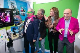 José Ángel Narváez, José Francisco Murillo, María Jesús Martínez y Pedro Montiel en el estand del Contenedor Cultural. Jornadas de Puertas Abiertas de la Universidad de Málaga. Complejo Polideportivo Universitario. Abril de 2018