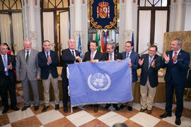 Entrega de la bandera de la ONU. Presentación del Centro Internacional de Autoridades y Líderes. Ayuntamiento de Málaga. Julio de 2018
